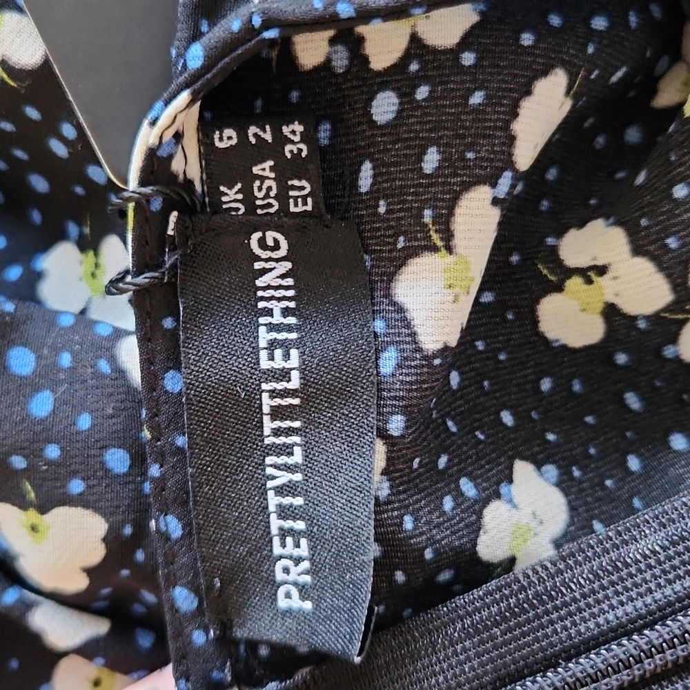 Brand new never been worn PrettyLittleThing dress. Size 2 women's